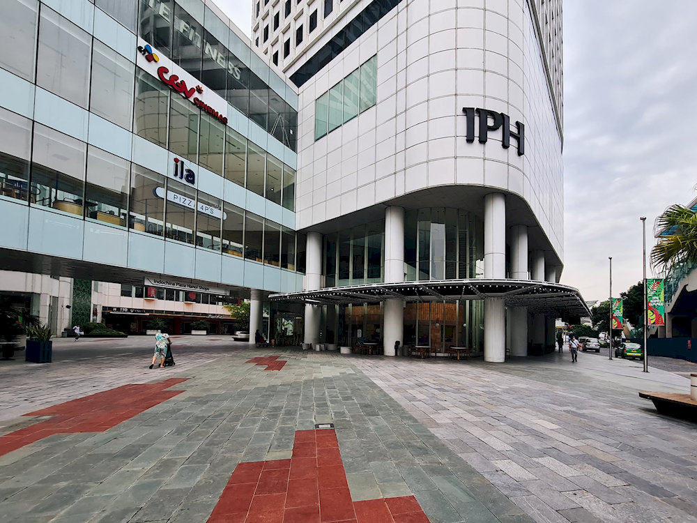 Indochina Plaza Hanoi with glass facade design reflects sunlight, creating a modern, trendy beauty
